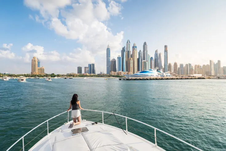 Group of travelers on Dubai Marina cruise